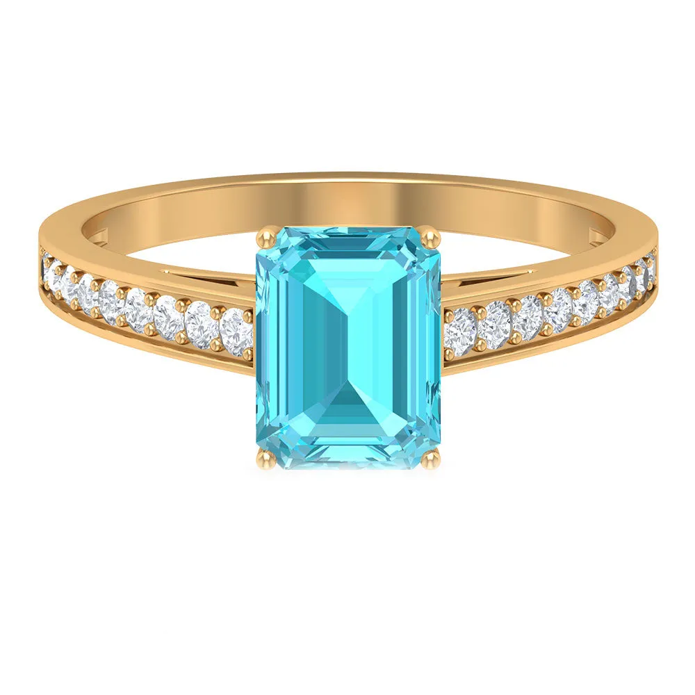 6X8 MM Emerald Cut Shaped Swiss Blue Topaz Solitaire with Diamond Side Stone Ring