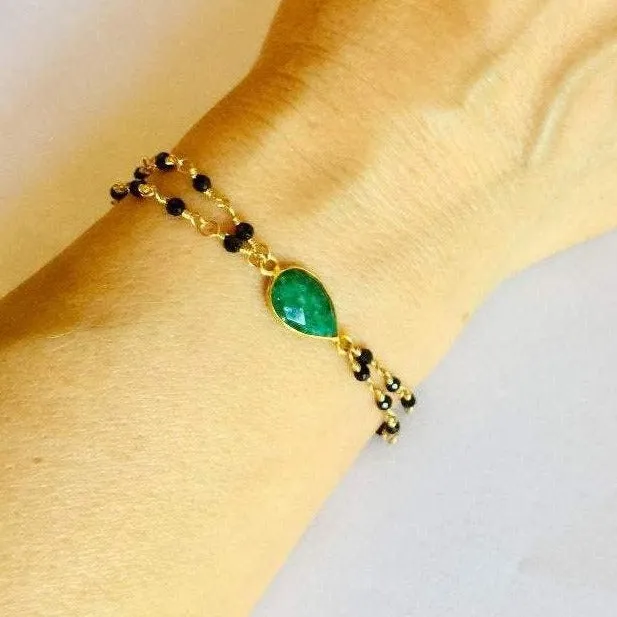 Black Spinel with Emerald