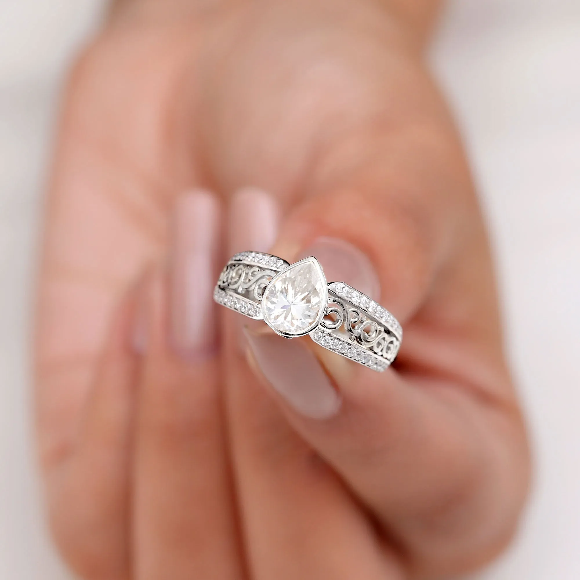 Pear Cut Solitaire Moissanite Two Tone Engagement Ring with Filigree Details
